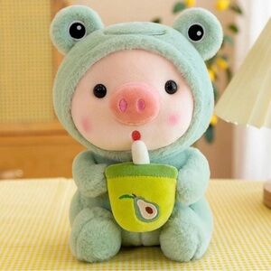 Charming Green Piggy Plush with frog costume and an Avocado bobba